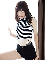 Slim Japanese tgirl Yui Kawai shows her little cock